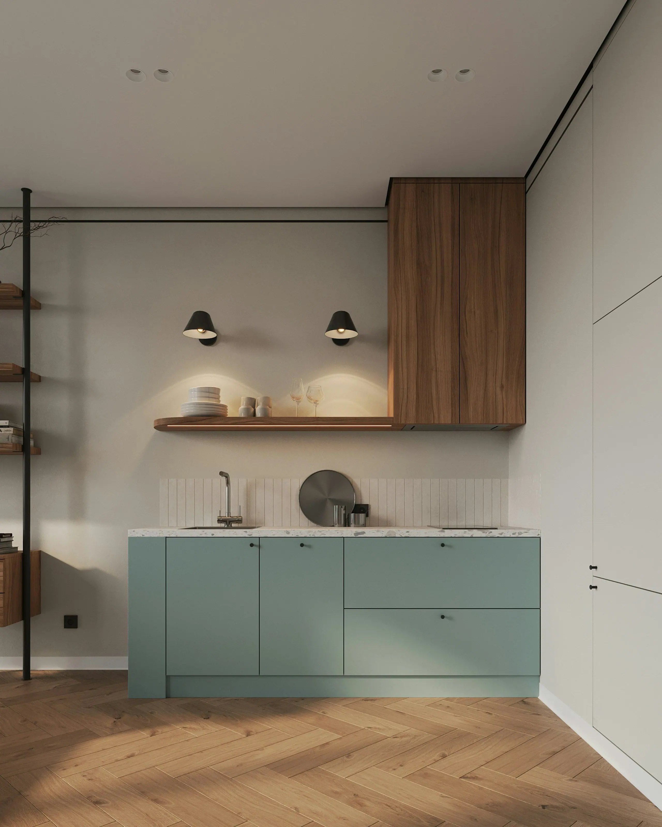 A clean, bright kitchen with sage-green units and a wooden worktop